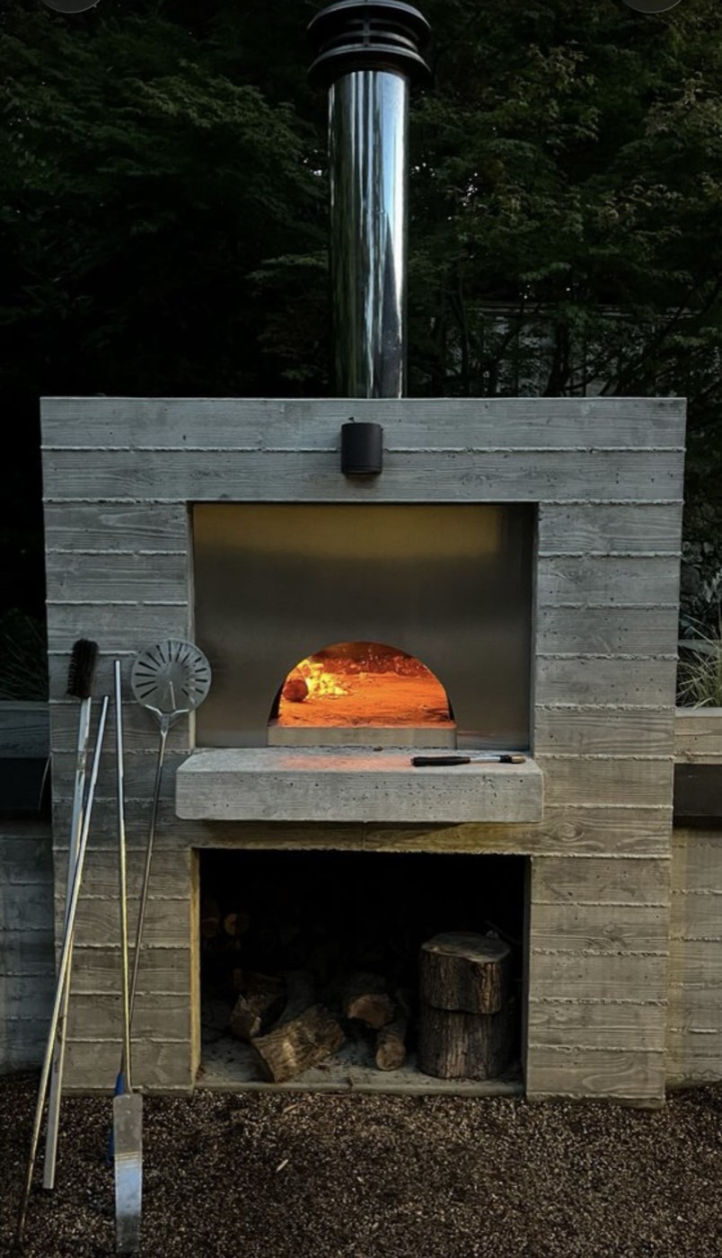 Wood-fired pizza oven ready for cooking