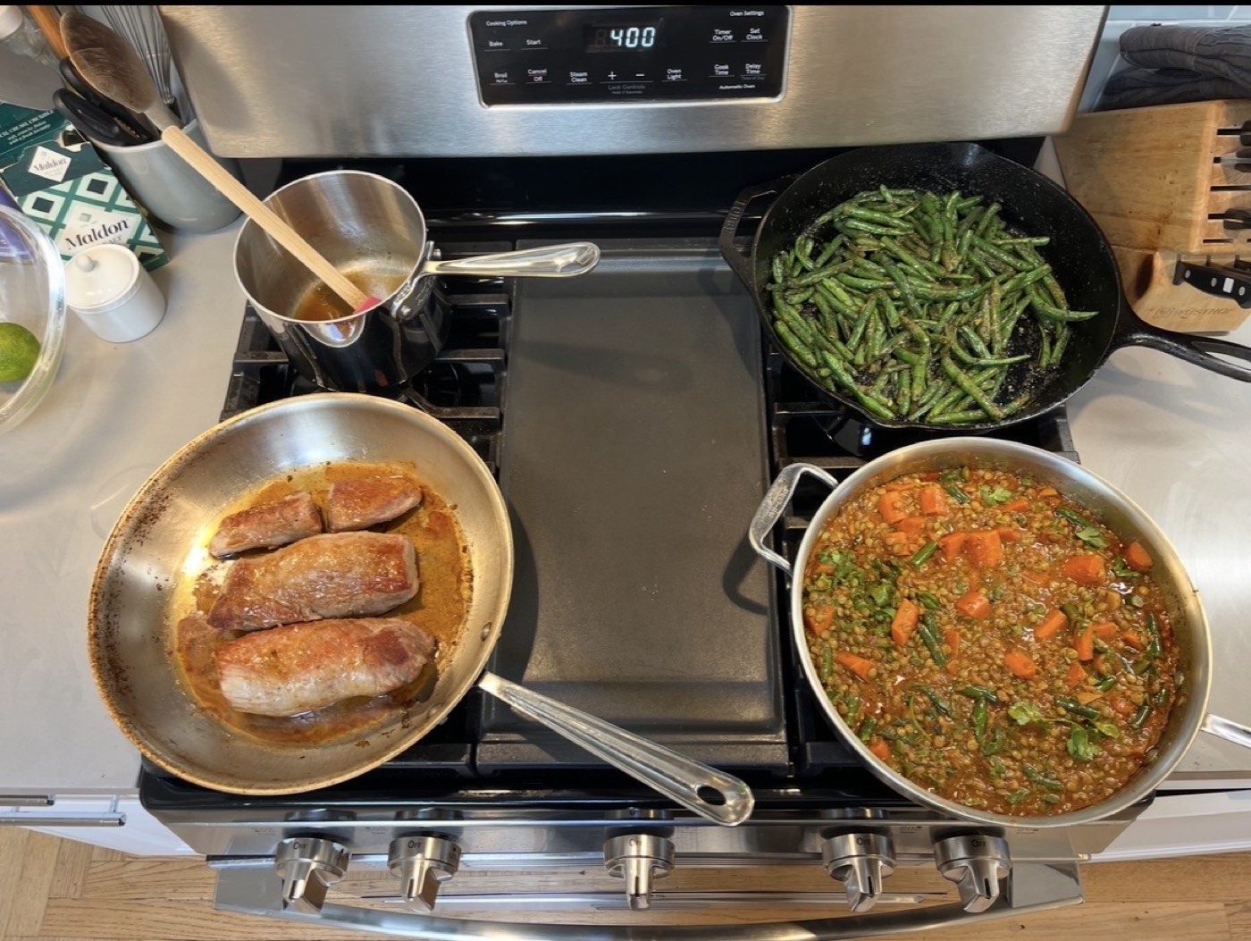 Seared pork medallions with green beans and lentil stew
